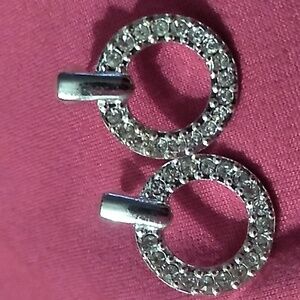 Vintage crystal and silver tone wreath earrings.